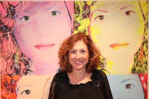 Hilary Topper with an Olan original