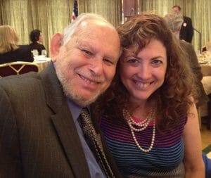 Dad and Hilary Topper at an event