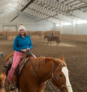 Hilary on a horse at Vista Verde Ranch