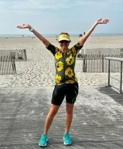 Hilary Topper on Beach with signature pose