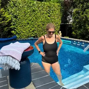 Hilary wearing an alanna marie suit