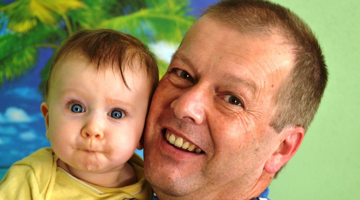grandpa with grandchild