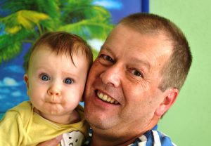 grandpa with grandchild